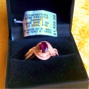 14 k rose gold Rhodolite garnet and diamond ring. Worn handful of times.size 7